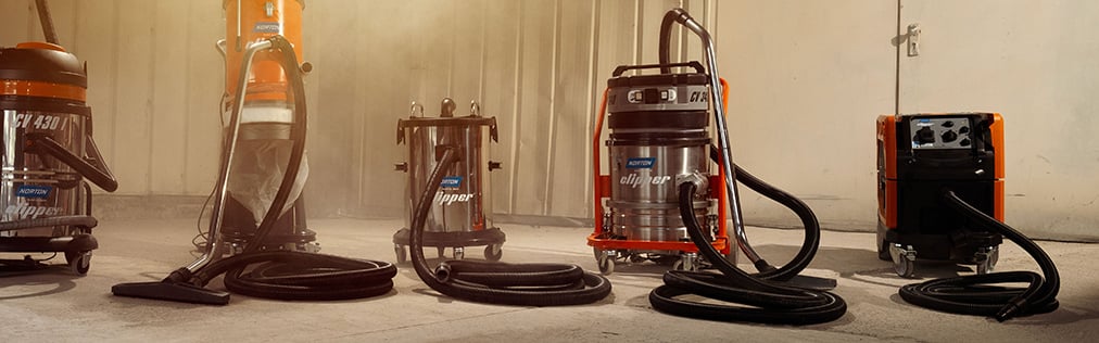 Industrial vacuum cleaners in a workshop environment
