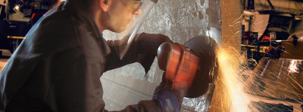 grinding large steel pipe