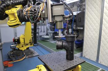 Grinding a part in the APS lab