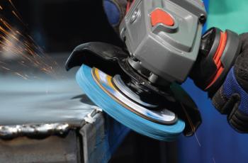 A Norton Vortex Rapid Blend non-woven wheel removes welds