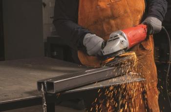 Operator using a Norton RazorStar fiber disc