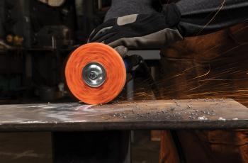 Operator using a Norton Blaze RapidStrip non-woven disc
