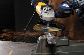 Close up of an operator using a 9" Norton Quantum3 depressed center wheel