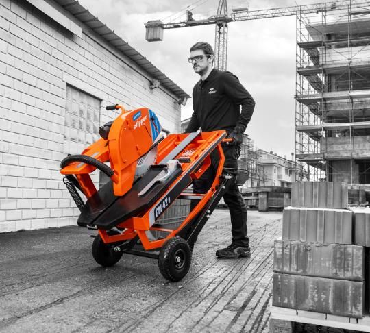 Man moving CM42 Dry machine