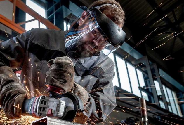 Man cutting metal