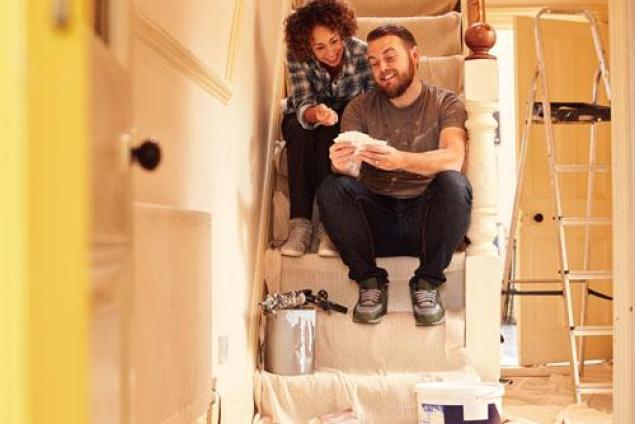 Two people sitting on a staircase