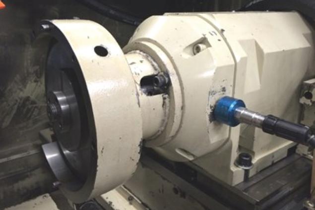 An accelerometer mounted on a grinding spindle