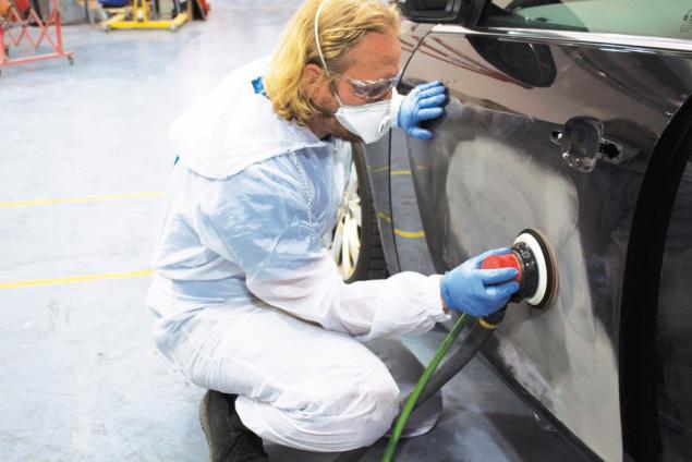 Polishing car with Norton
