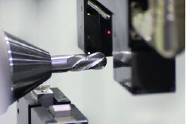 ANCA uses laser gages fitted inside its grinding machines and feeds data to its own controllers for precise in-process compensation