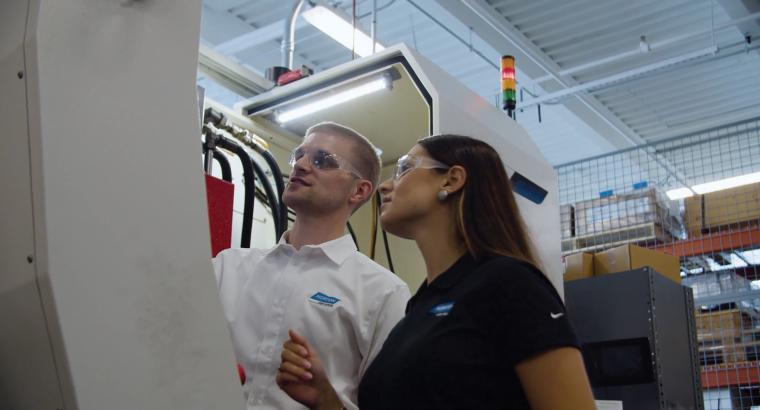 application engineers with machine