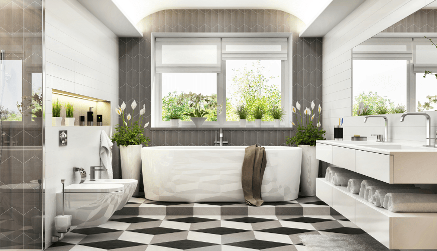 Image shows a scene of a modern bathroom decorated in black and white porcelain tiles.