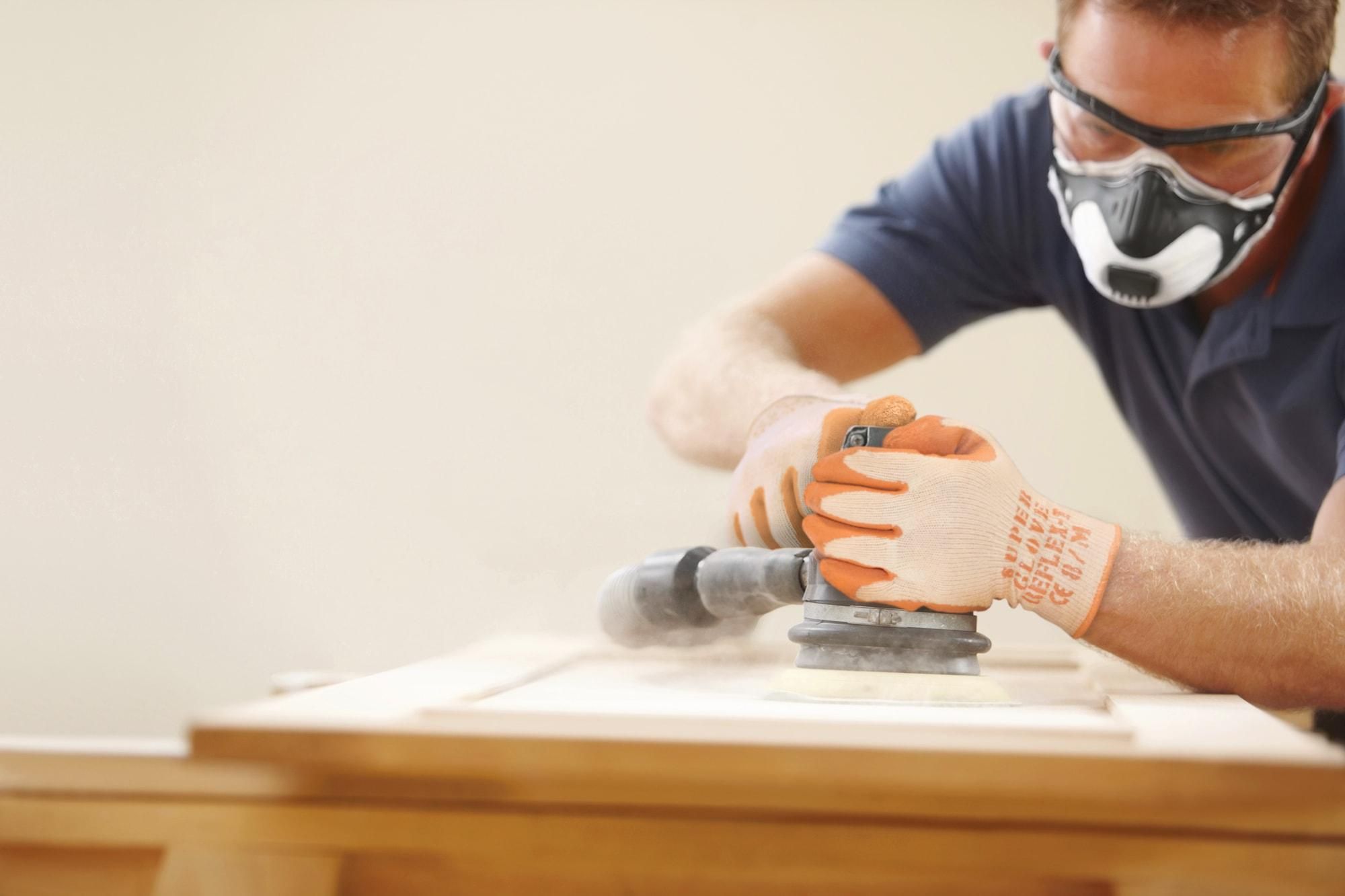 Sanding down a kitchen cupboard door