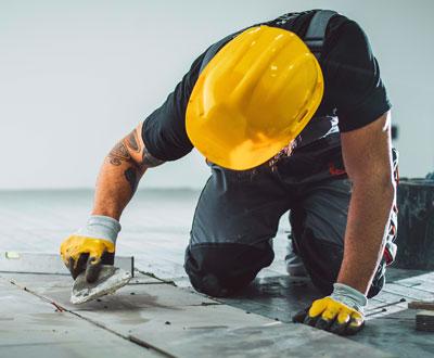 man-floor-tiling