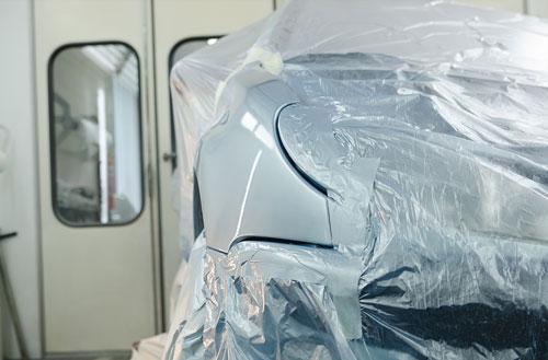 Collision repair on silver car